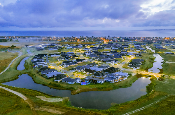 Palm Springs residential area in Papamoa showing housing surrounded by waterways