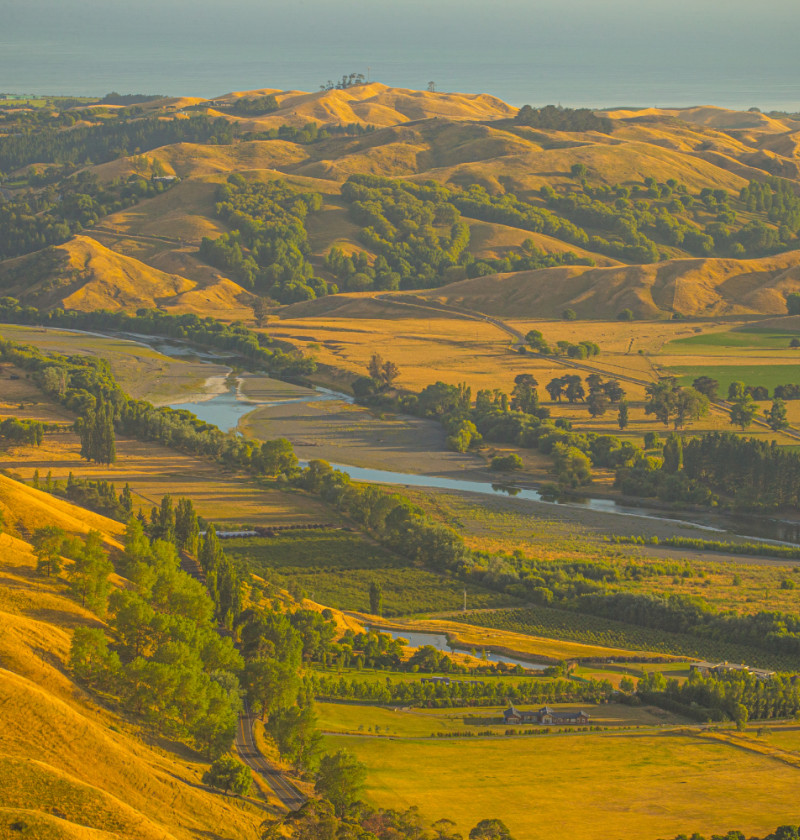 A rural landscape at sunrise.  